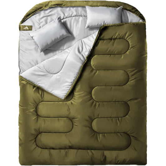 An olive green sleeping bag with a white interior lining and two white pillows, shown against a plain white background.