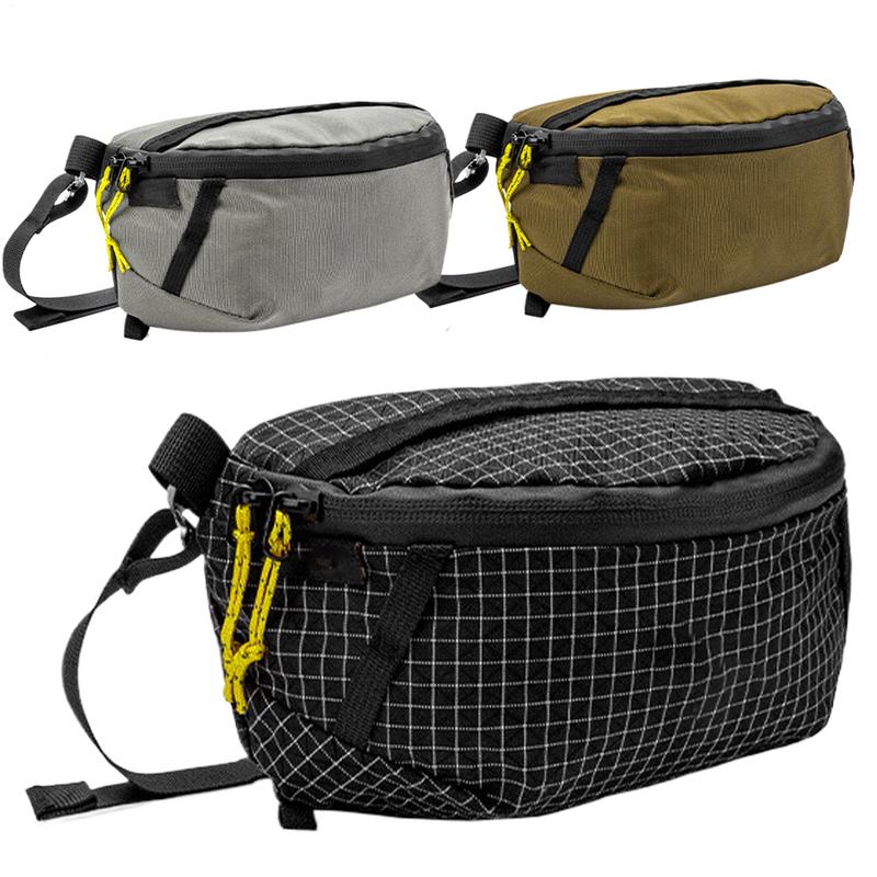 Three bags in gray, green, and black with grid pattern on a white background