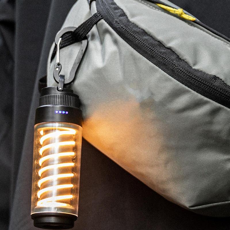 Portable light attached to a backpack with glowing interior