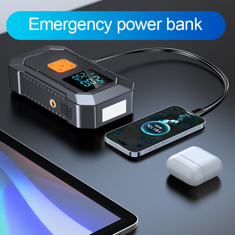 Emergency power bank charging a smartphone and wireless earbuds on a dark surface.