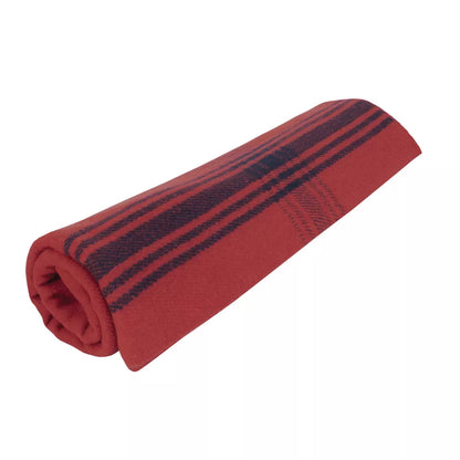 Rolled red wool camping blanket with navy blue stripe design