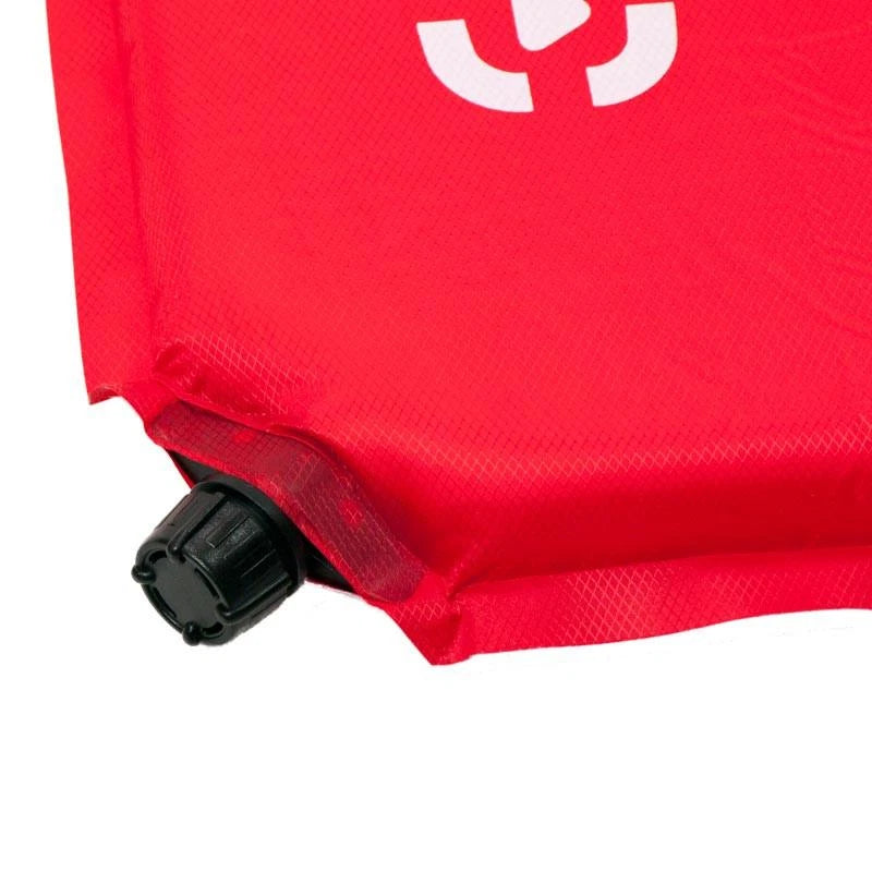 Close-up of a red inflatable pouch with a black valve connector and a white logo on a white background.
